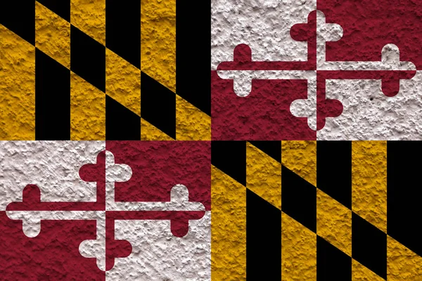 La bandera nacional del estado de Maryland en contra de un wal gris — Foto de Stock