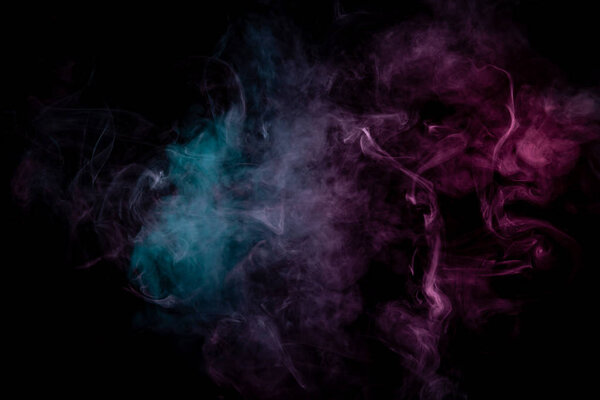 Colored background with winding clouds of smoke from patterns of different forms of pink, green and blue colors with tongues of flame on a black isolated background. Print for t-shirt.