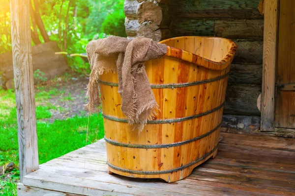 Old Russian bath made by hand from a tree for washing and relaxi