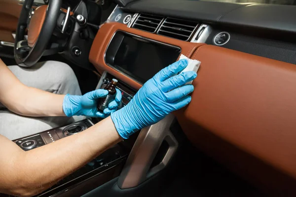 Applying a nano-ceramic coating for interior leather on the car' — Stock fotografie