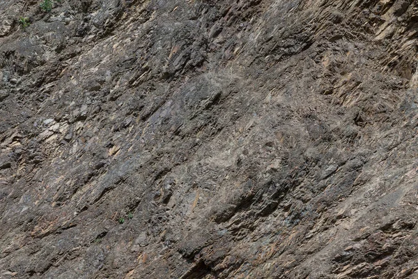 Fondo con una textura rugosa de color gris de piedra y roca —  Fotos de Stock