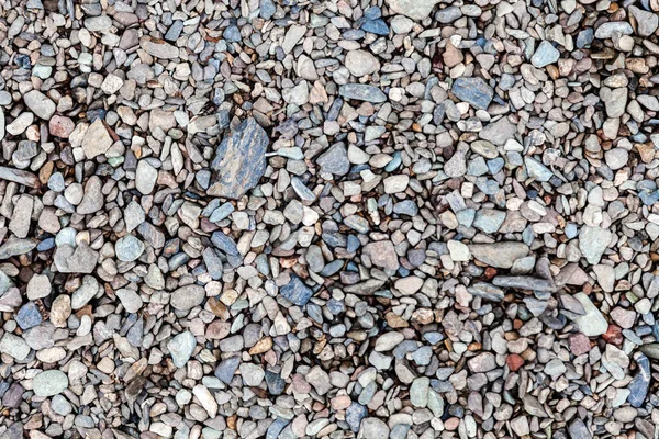 Фон и текстура разноцветных серых камней и гальки — стоковое фото