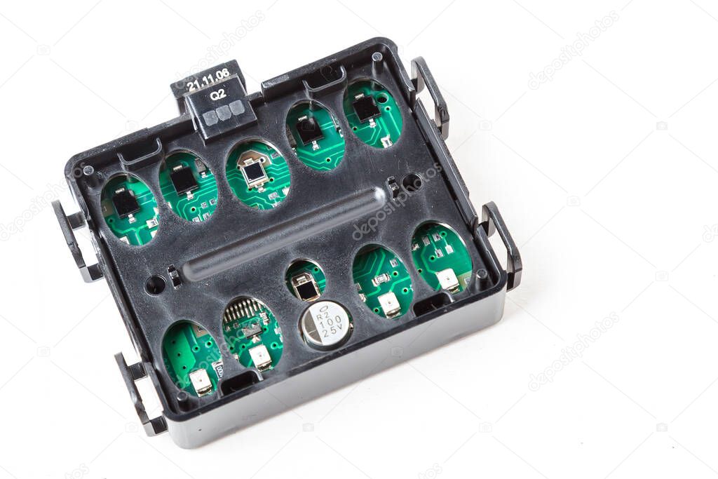 Electronic board in a black plastic box with light and rain sensors to automatically turn on lights and wipers during rain or at night. Auto parts catalog.