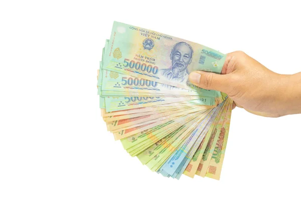 kırpma yolu Vietnam üzerinde sağ el (Sosyalist Cumhuriyeti Vietnam), Dong, Vnd, ödeme, para değişimi beyaz arka plan üzerinde izole para.