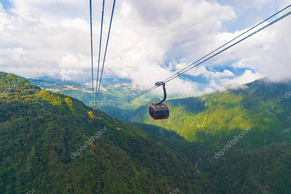 Cable car In the middle of the valley, fog in cloud background of country in Fansipan mountain SAPA VIETNAM.