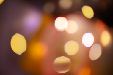 Bulanıklık ve bokeh doku kırmızı, sarı Chrismas Vintage tarzı soyut renkli ışıklar.