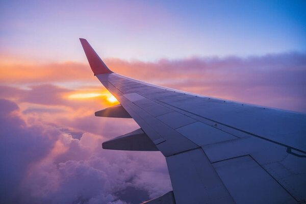 Beautiful sunset, sky on the top view, airplane flying view from