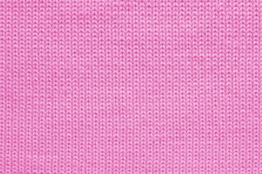 Doku pembe yün örme kumaş yakın kadar soyut Tekstil arka plan, kavram sıcak giyim 