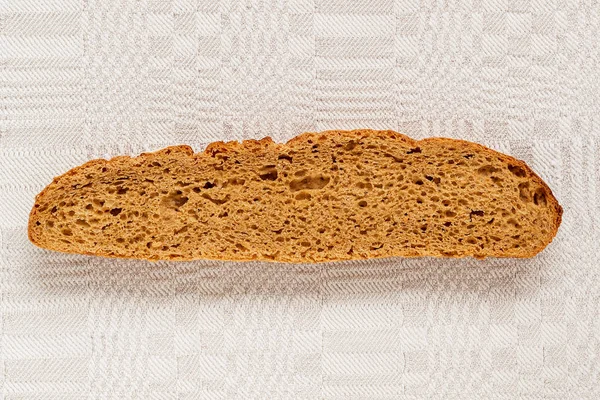 Fatia Pão Centeio Com Uma Crosta Marrom Crocante Apetitosa Uma — Fotografia de Stock
