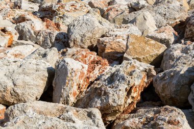 Arka plan büyük bej kırmızı taşlar. Jeolojik soyut doku. Kumtaşı büyük kayalar