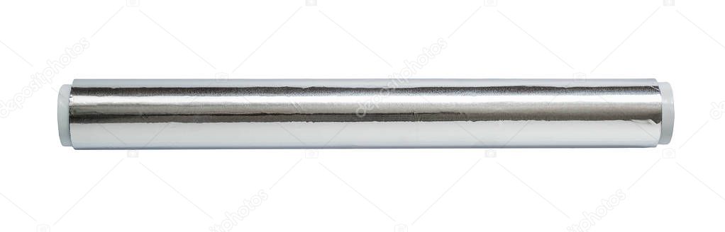 Aluminum foil for baking and roasting close-up. Roll of food foil, top view. Wrapping food foil isolated on a white background. Kitchen utensil for cooking.