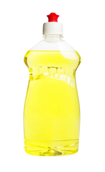 Желтая жидкость для мытья посуды в прозрачной пластиковой бутылке — стоковое фото