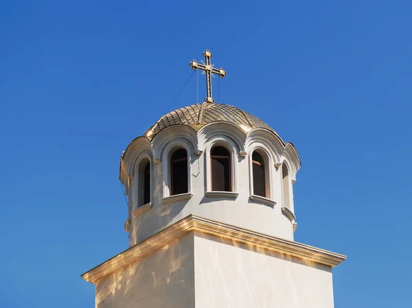 Golden dome with a cross on the Christian Orthodox Church