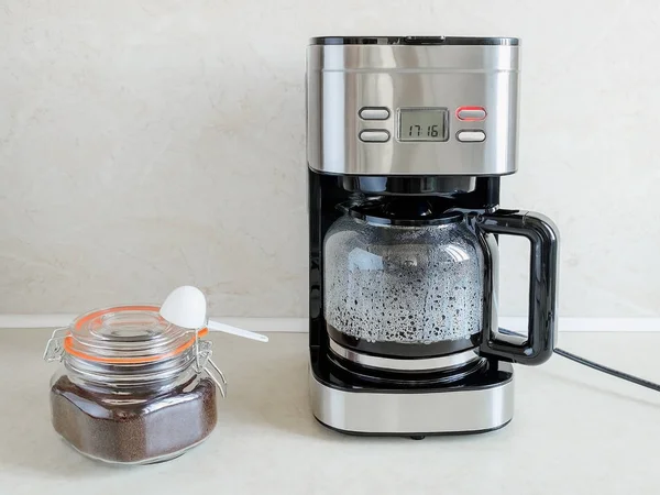 Drip-type coffee maker brews coffee for the first time