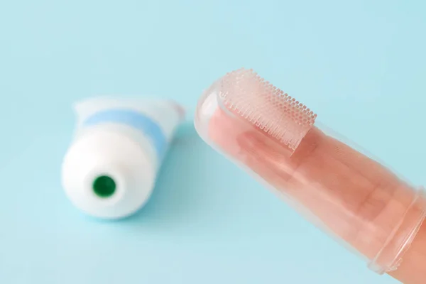 Silicone toothbrush for dogs and cats that fits on a finger — Stock Photo, Image
