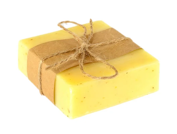 Yellow handmade lemon soap bar isolated on white background. — Stock Photo, Image