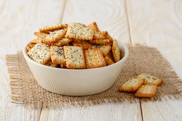 Small Salty Rectangular Crackers Poppy Sesame Seeds Beige Ceramic Bowl — Stock Photo, Image