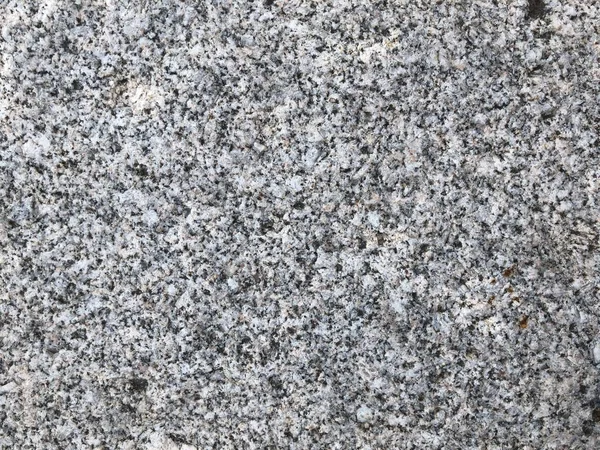 Powierzchnia naturalnego kamienia granitu — Zdjęcie stockowe