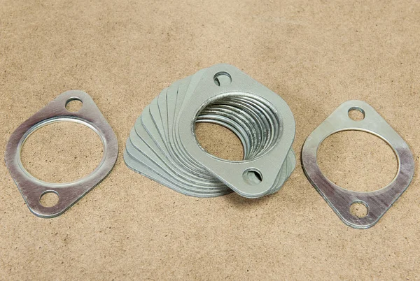 Automotive gasket for the exhaust system