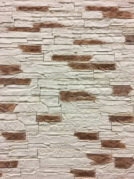 Artificial stone. Decorative wall of artificial torn stone. background or texture.