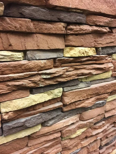 Artificial stone. Decorative wall of artificial torn stone. background or texture.