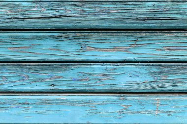 Eski mavi boyalı panoları için arka planı olarak kullanma.