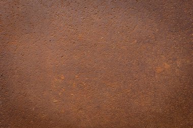 Eski paslı demir metal arka plan plakası dokusu.