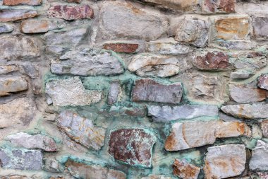Taş duvar bir arka plan olarak kullanmak için.