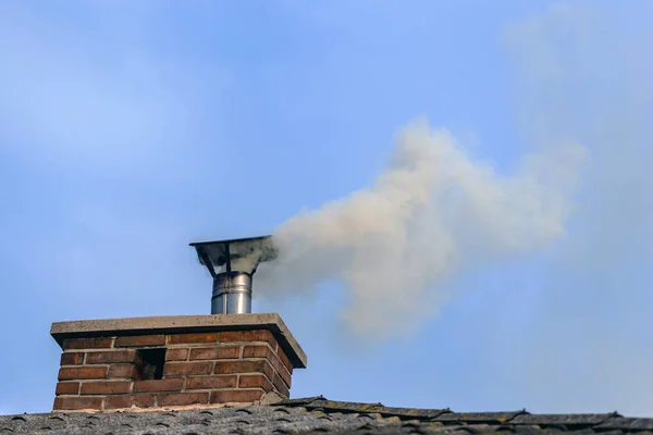 Smoke Coming Out House Chimney Royalty Free Stock Photos