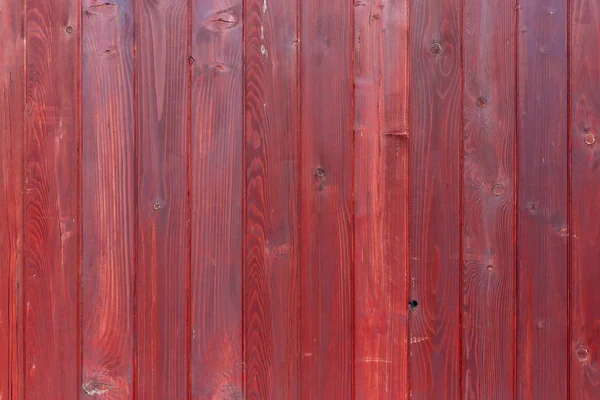 La vieille texture de bois rouge avec des motifs naturels — Photo