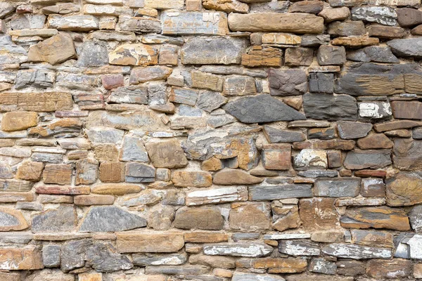 Pared de piedra para uso como fondo — Foto de Stock