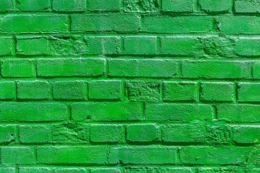 Eski yeşil tuğla bir duvarın arka plan dokusu.