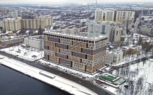 House - brick on the river bank - aerial view from water side