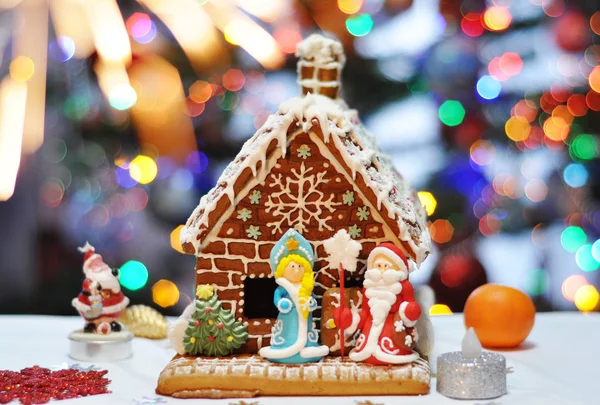 christmas gingerbread house with bright  bokeh background