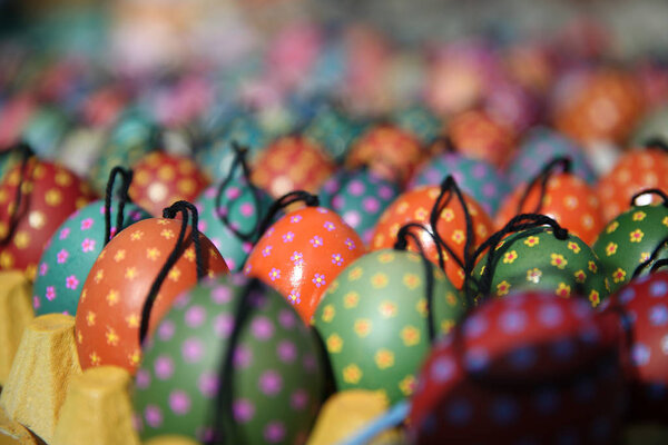 Decorative eggs on Easter market in the street of Budapest, Hungary. Selective focus.