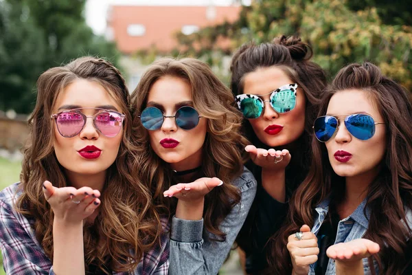 Fashionable ladies with hairstyle taking selfie outdoors. — Stock Photo, Image