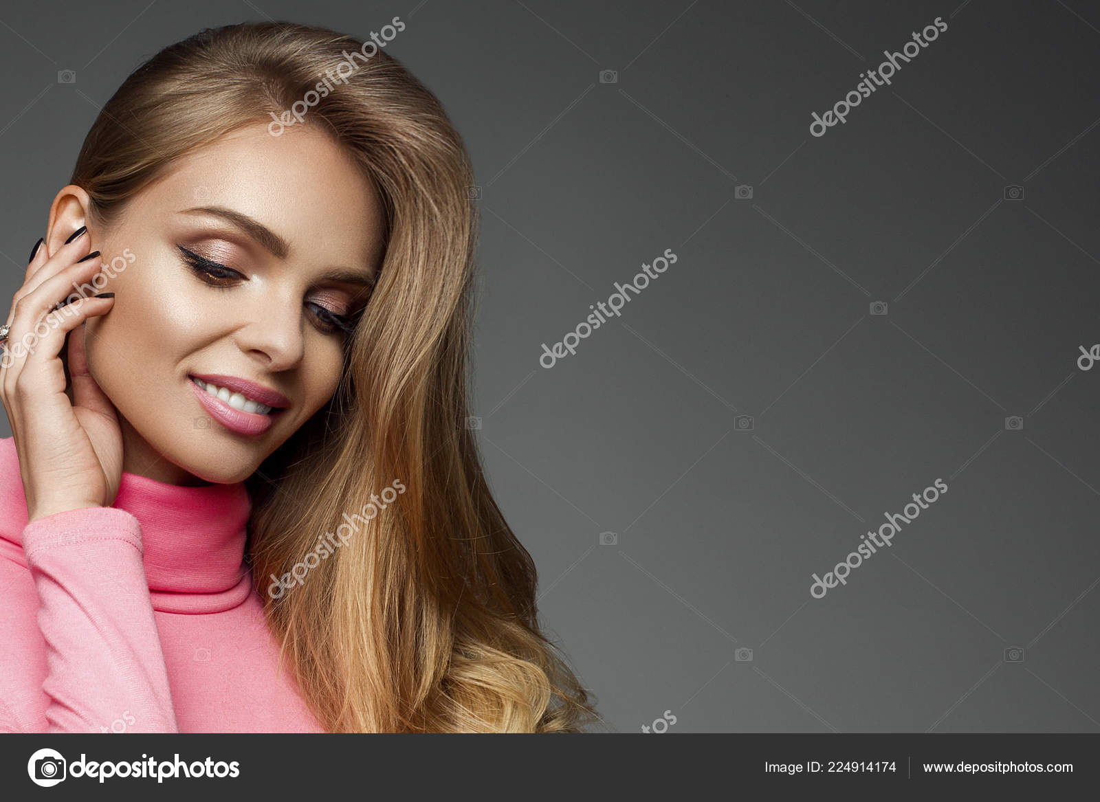 Gorgeous Blonde Long Haired Woman With Perfect Skin And Make Up