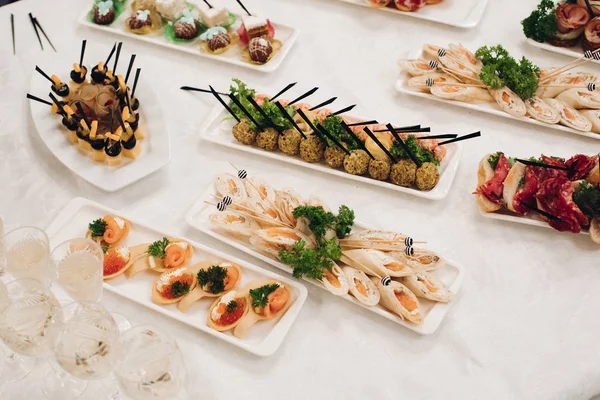 Several snacks served on birthday party or wedding celebration. — Stock Photo, Image
