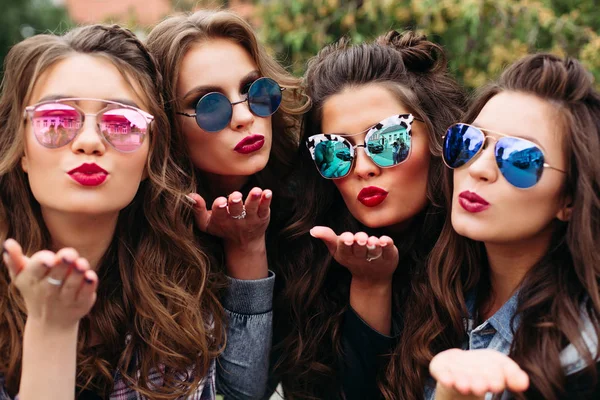 Fashionable ladies with hairstyle taking selfie outdoors. — Stock Photo, Image