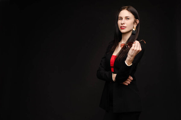 Portrait of young beautiful woman thoughtfully looking down.