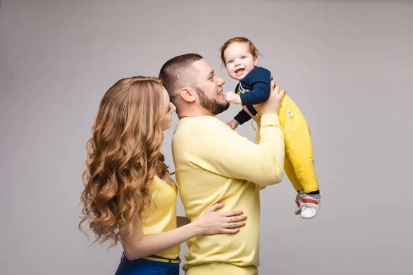 Portrait of happy family from three people posing at camera. — Stock Photo, Image