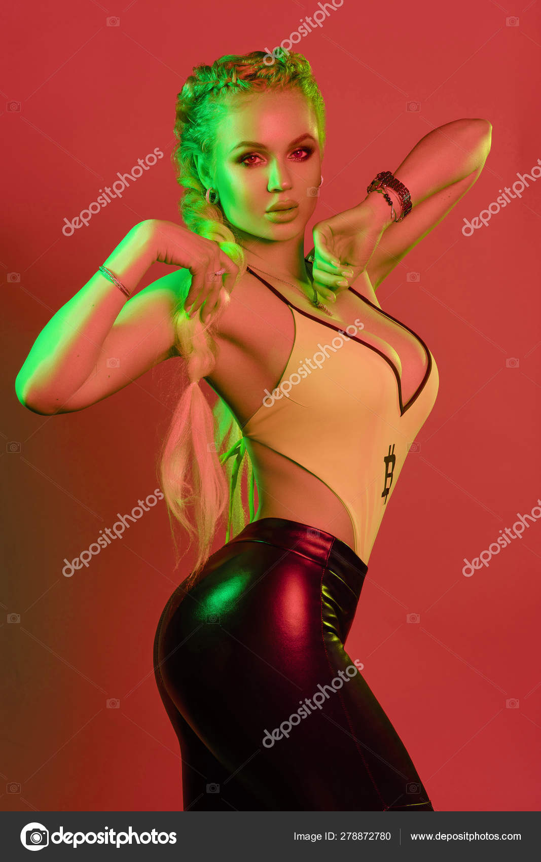 Sexy hot blonde in leggings and top posing Stock Photo by ©studioluckyaa  278872780