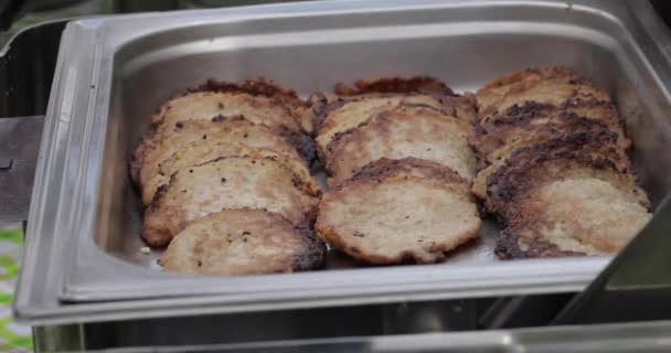 Liver pancakes in metallic container. — Stock Video