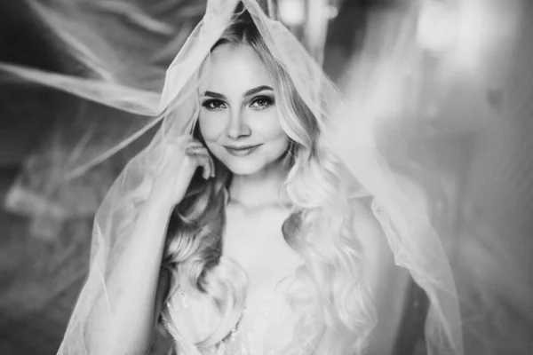 Monochrome portrait of sensuality and charming smiling bride. — Stock Photo, Image