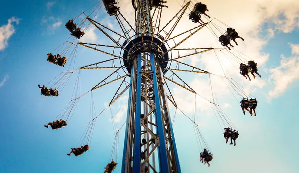 Swings in amusement park — Stock Photo, Image