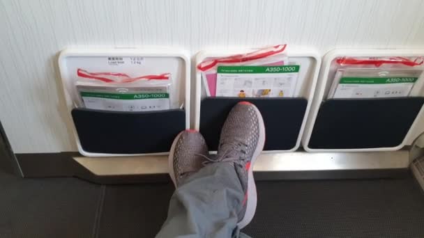 Extended leg space on airplane shot shot — Stok Video