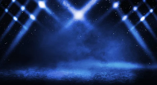 Blue misty dark background. Dark street with smoke, fog, blue spotlights, neon. Dark abstract empty background.