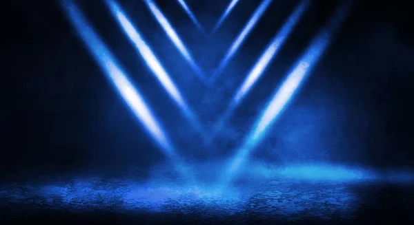 Blue misty dark background. Dark street with smoke, fog, blue spotlights, neon. Dark abstract empty background.