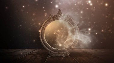 Mirror magic, fortune telling and fulfillment of desires. Fantasy with a mirror, dark room, magical power, night view.