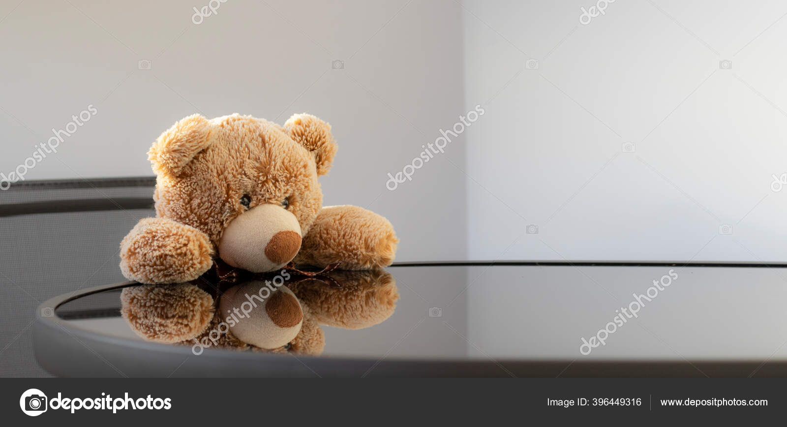 Teddy Bear Soft Toy Sits Black Glossy Table Reflection Light Stock Photo by  ©Vitalina_G 396449316